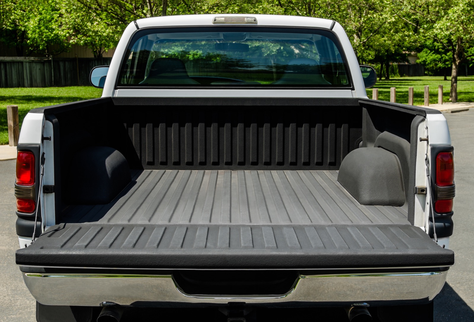 Close view of a pickup bed during a condition review